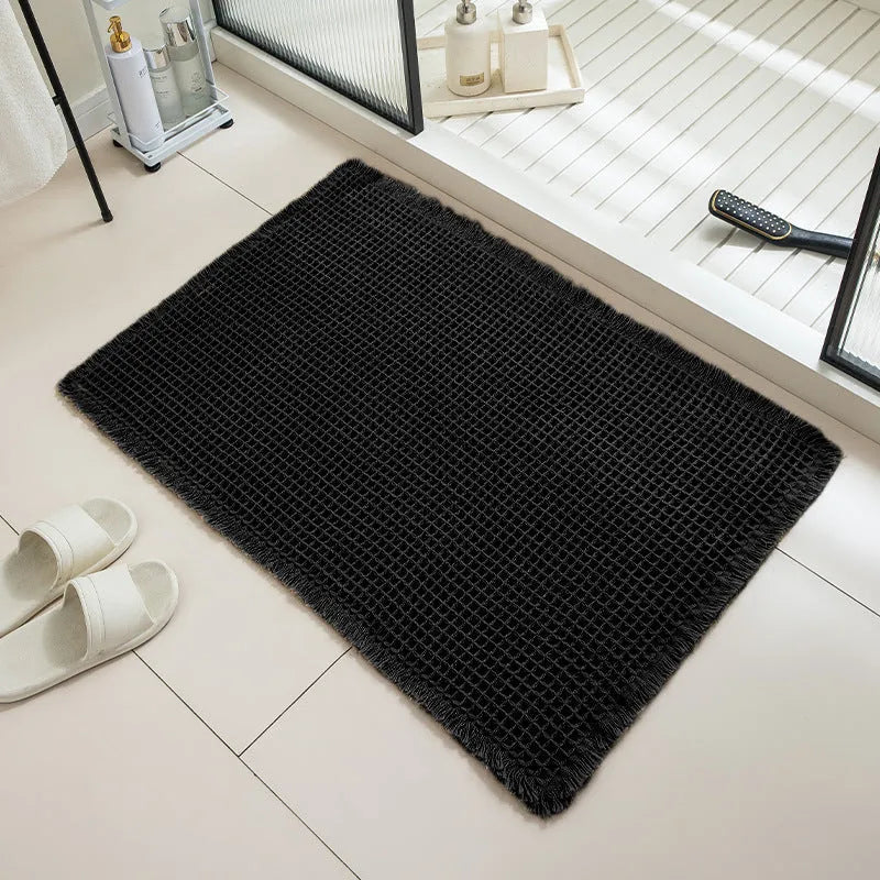 Checkered non-slip bathroom floor carpet in beige, available in multiple sizes from 43x61cm to 61x183cm