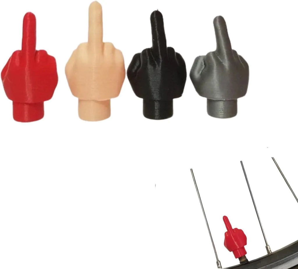 Set of four latex tyre valve caps, showing two skin colour and two black pieces, for car wheel protection.