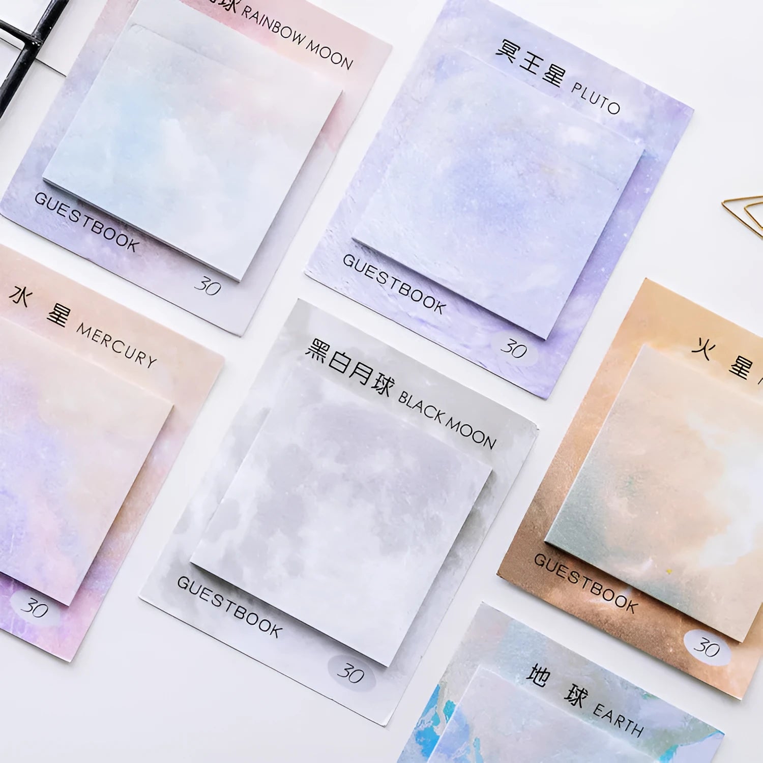Square planet sticky notes pad showing celestial oil painting designs in six colour variations