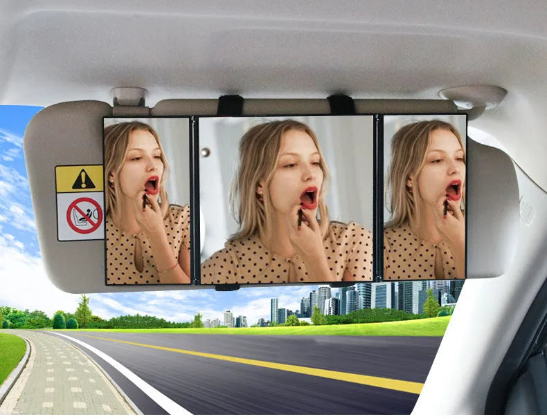 Silver car folding makeup mirror shown closed at 15.5cm and opened to 30.5cm wide.