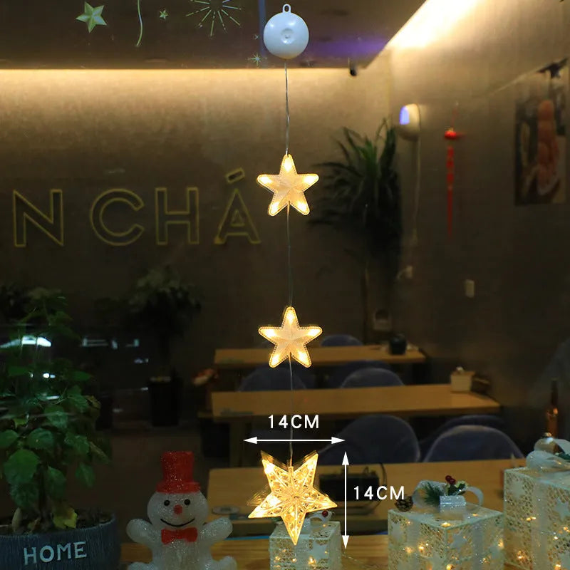 Christmas LED window decorations with suction cups showing star, tree, and deer pendant designs