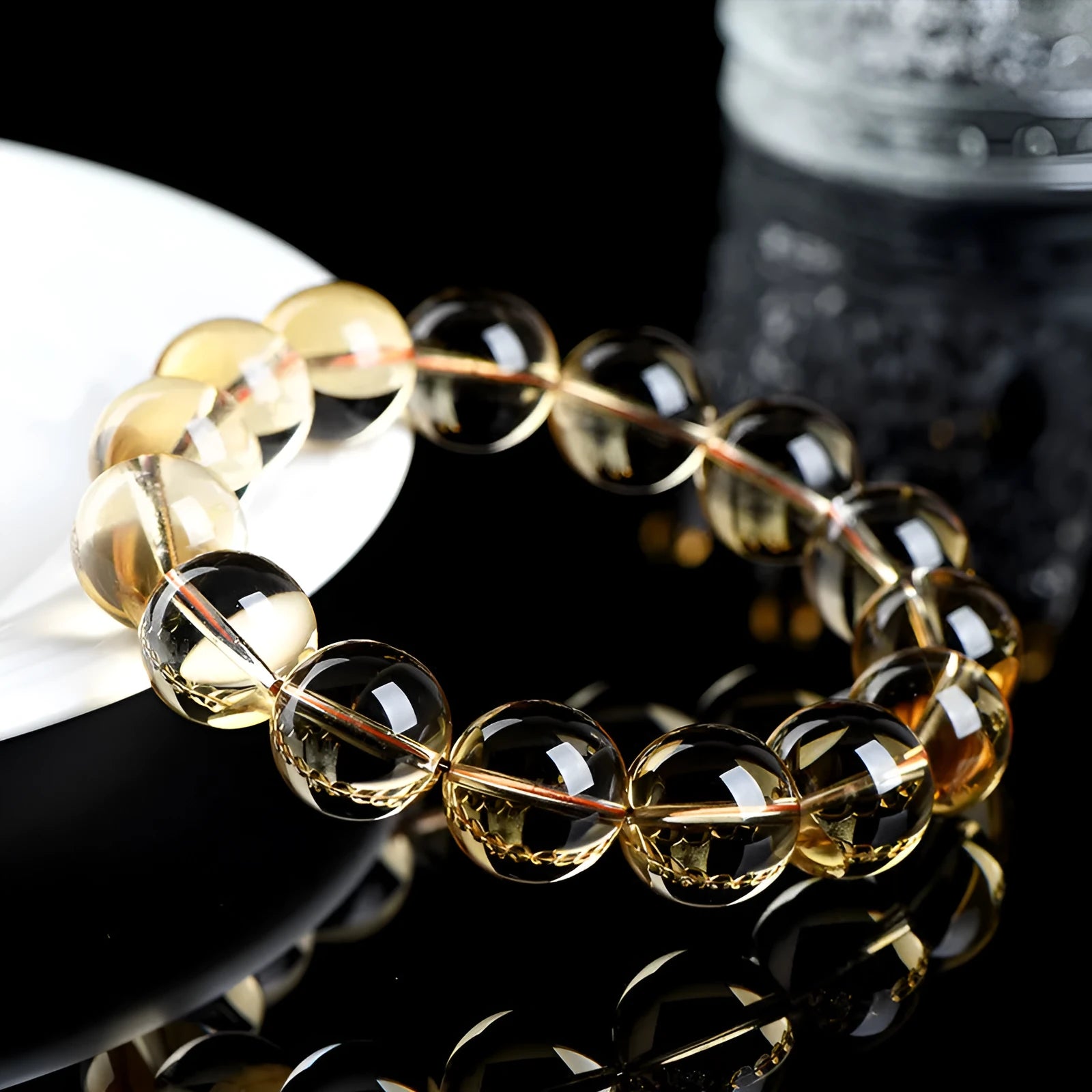 Natural citrine scattered beads ball bracelet showing polished beads in 7A and 6A colour grades.