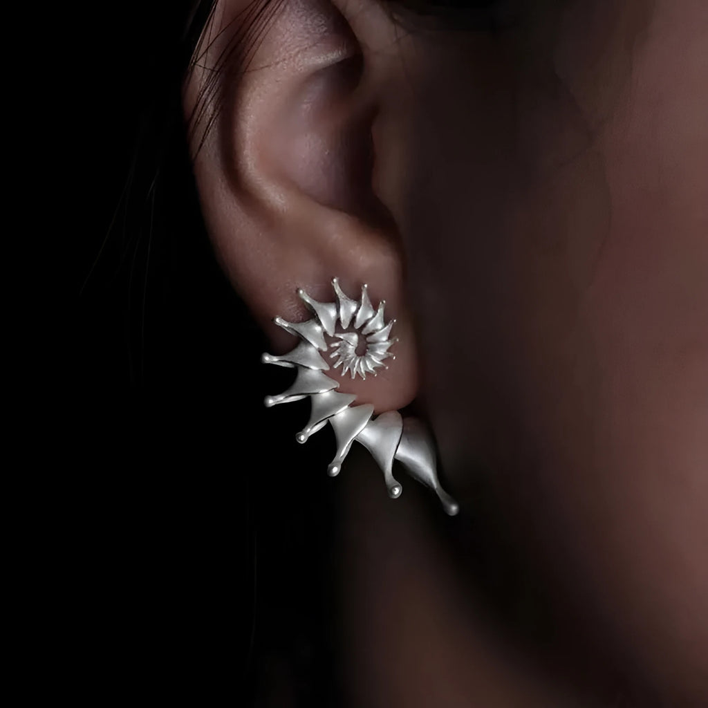 Conch-shaped three-dimensional matte finish alloy ear studs with irregular styling