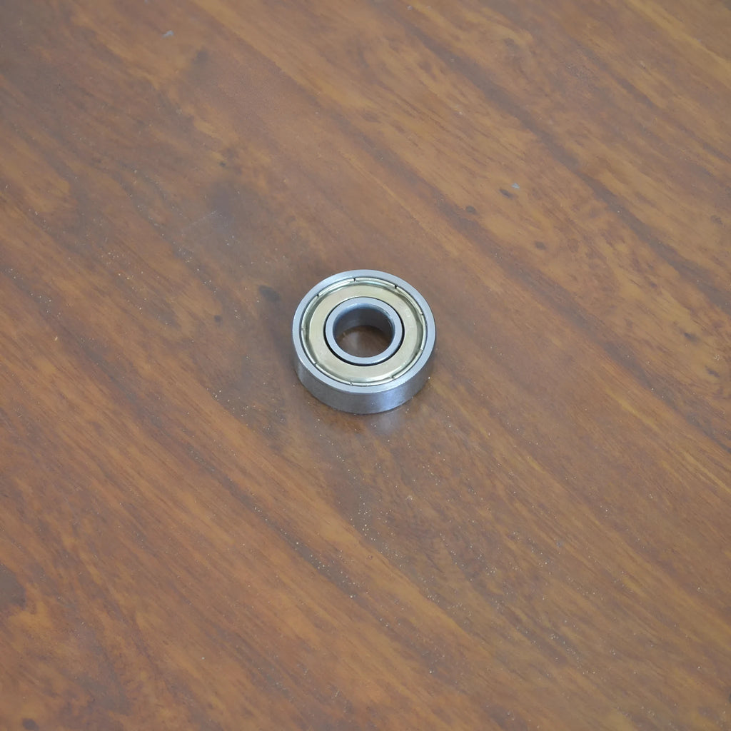 6000z carbon steel ball bearing showing 10mm bore, 26mm outer diameter, 8mm width, and iron cage.