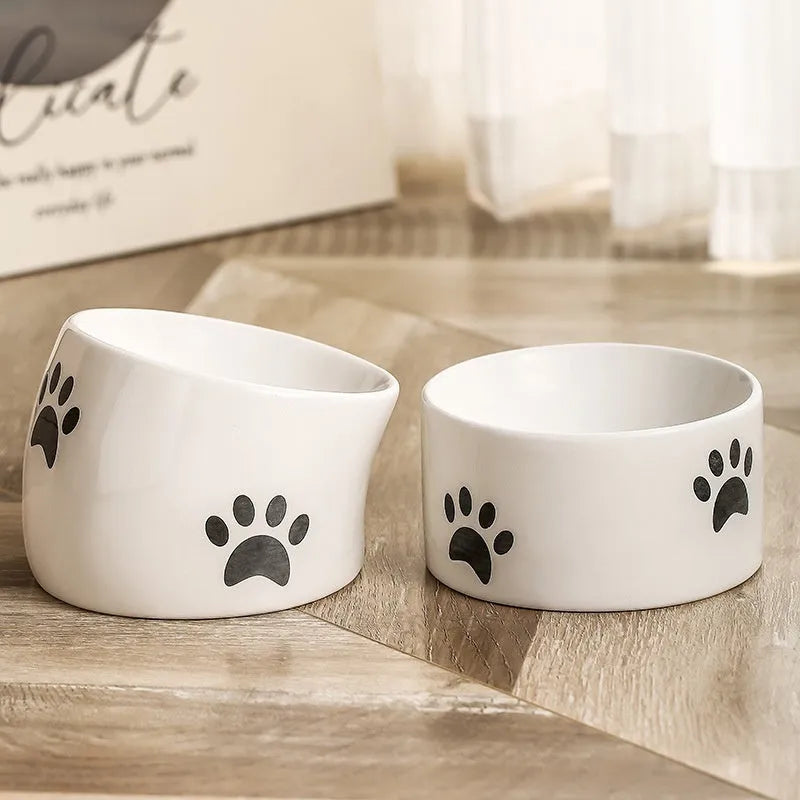 Ceramic cat bowl with neck protection design and cat's paw pattern in selected colour