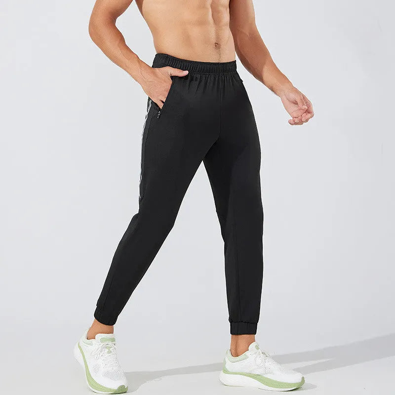 Men's black polyester running exercise pants with a mid-waist fit.