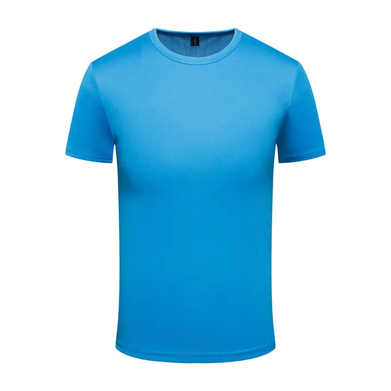 Man wearing a solid colour short sleeve casual T-shirt on a neutral background