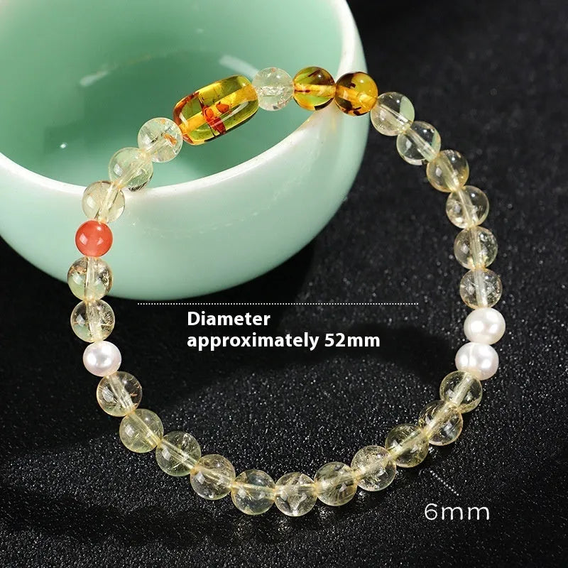 Women's handmade beaded bracelet with Huang Tajing white crystal, freshwater pearls, and yellow tower crystals