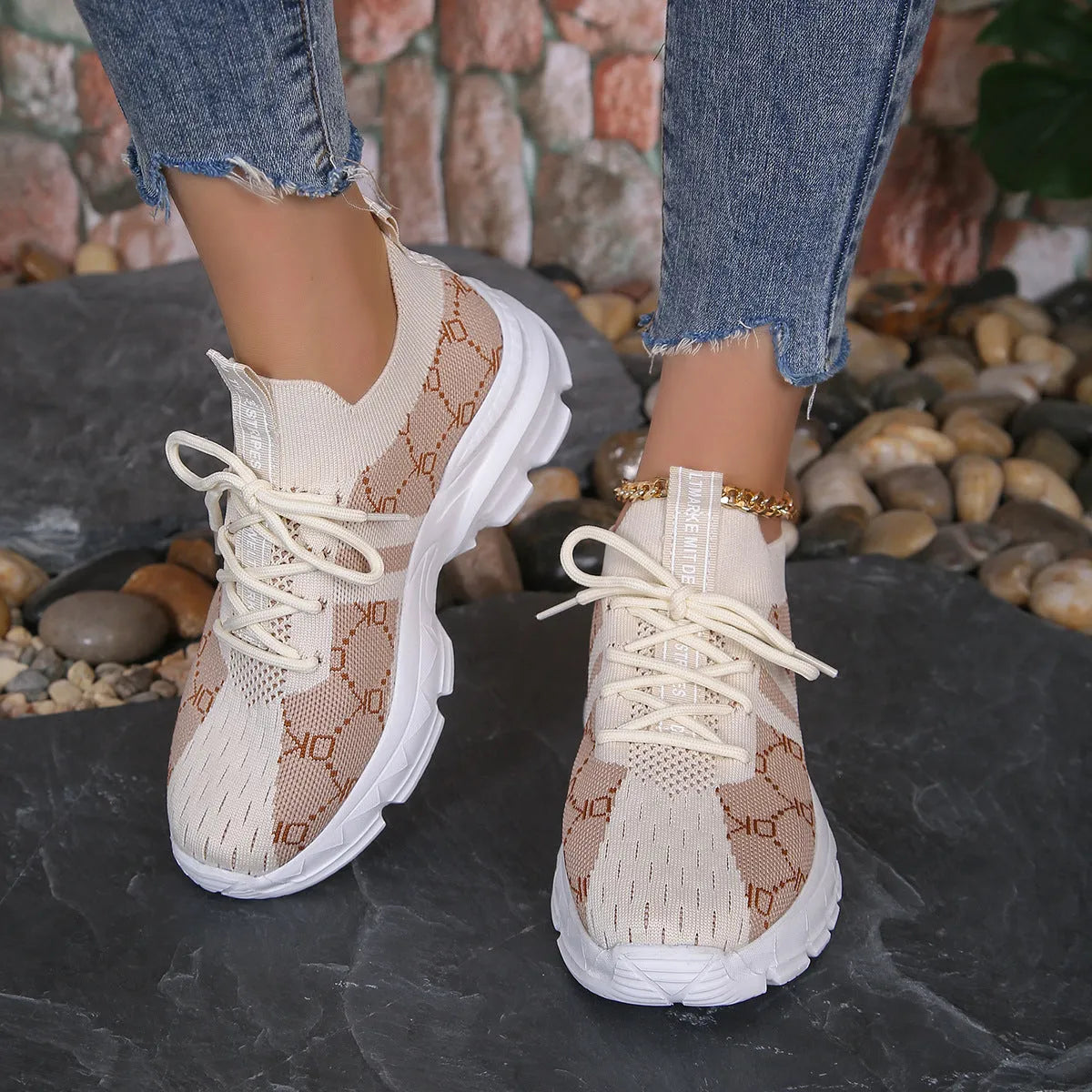 Women's breathable mesh lace up flat sneakers in light brown with rubber sole and round toe