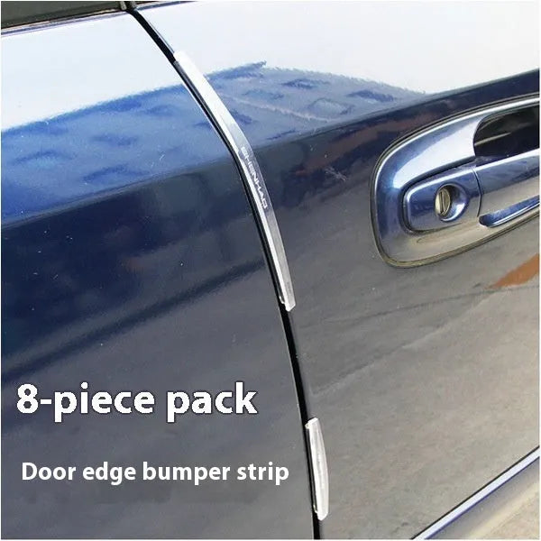 White plastic car door edge protection bumper strip on a vehicle door.