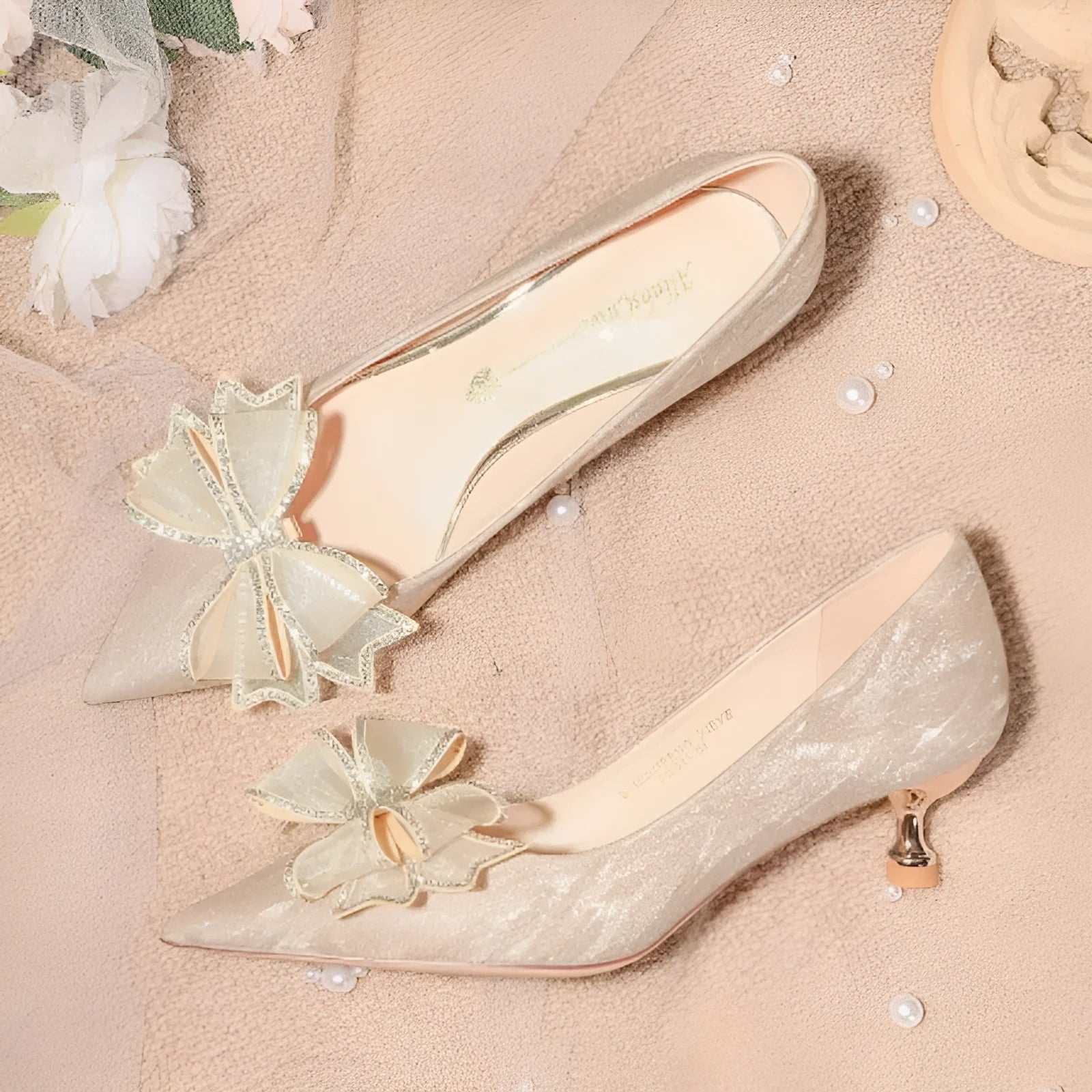 Champagne gold women's stiletto pumps with sequin and crystal decoration, pointed toe, and low top