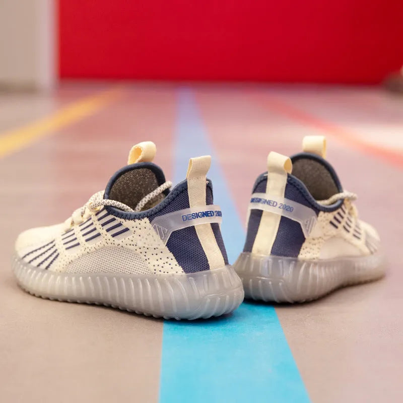 Men's white flying fabric breathable sneakers with mesh lining, round toe and low upper design on a neutral background.