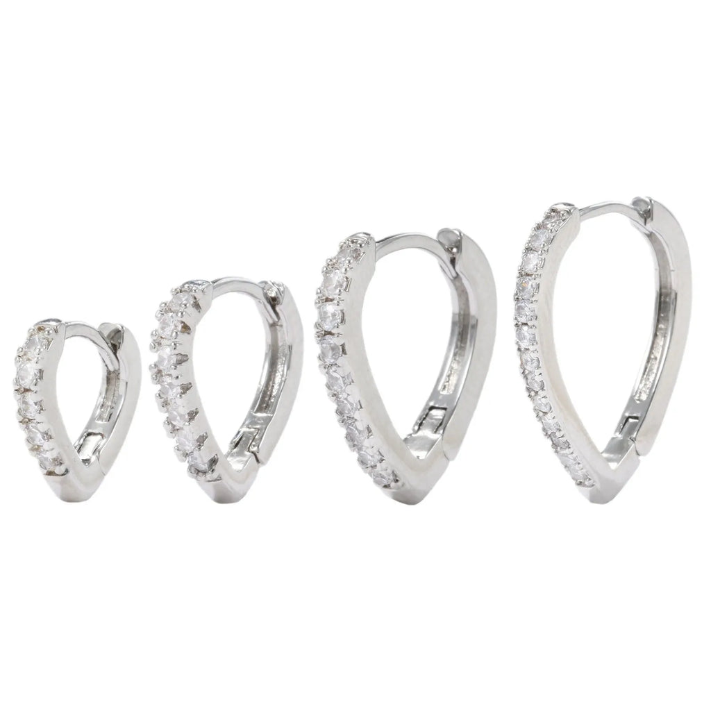 Gold and white geometric heart-shaped copper ear clip for women.