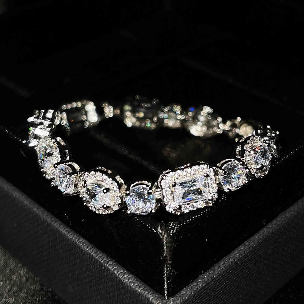 Geometric women's silver bracelet with zircon stones, shown in two length options.
