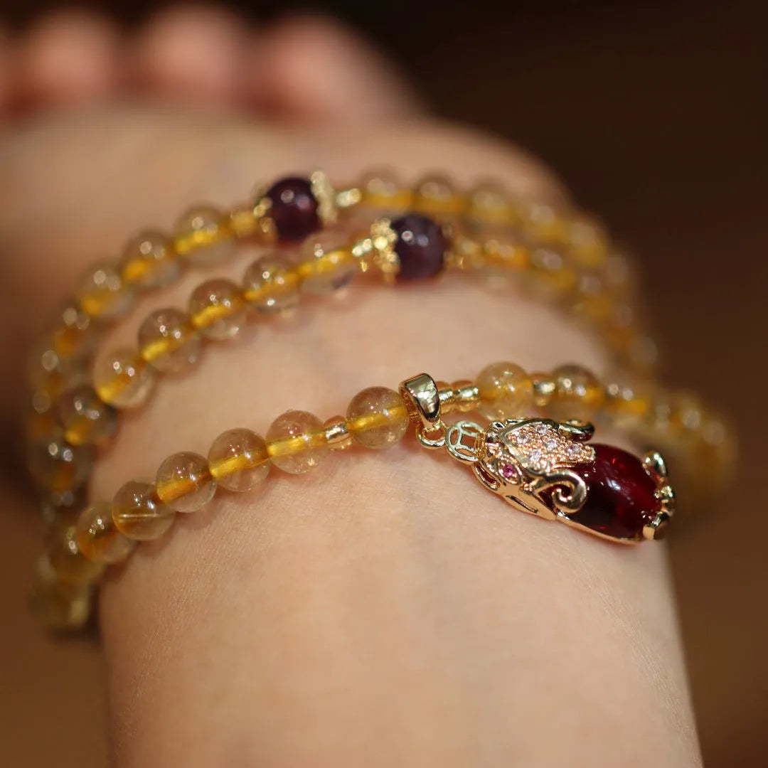 Natural Brazilian gold rutilated quartz bracelet with Chinese style design and hanging chopsticks
