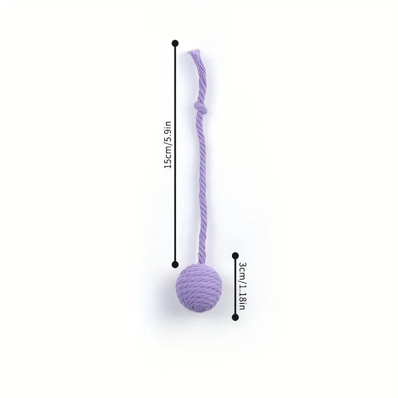 Cat toy ball with rope handle in green, pink, purple or yellow colours with internal bell