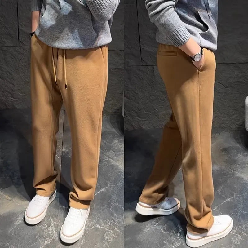 Loose men's cotton-blend sweatpants in solid colour with wide leg and drawstring waist