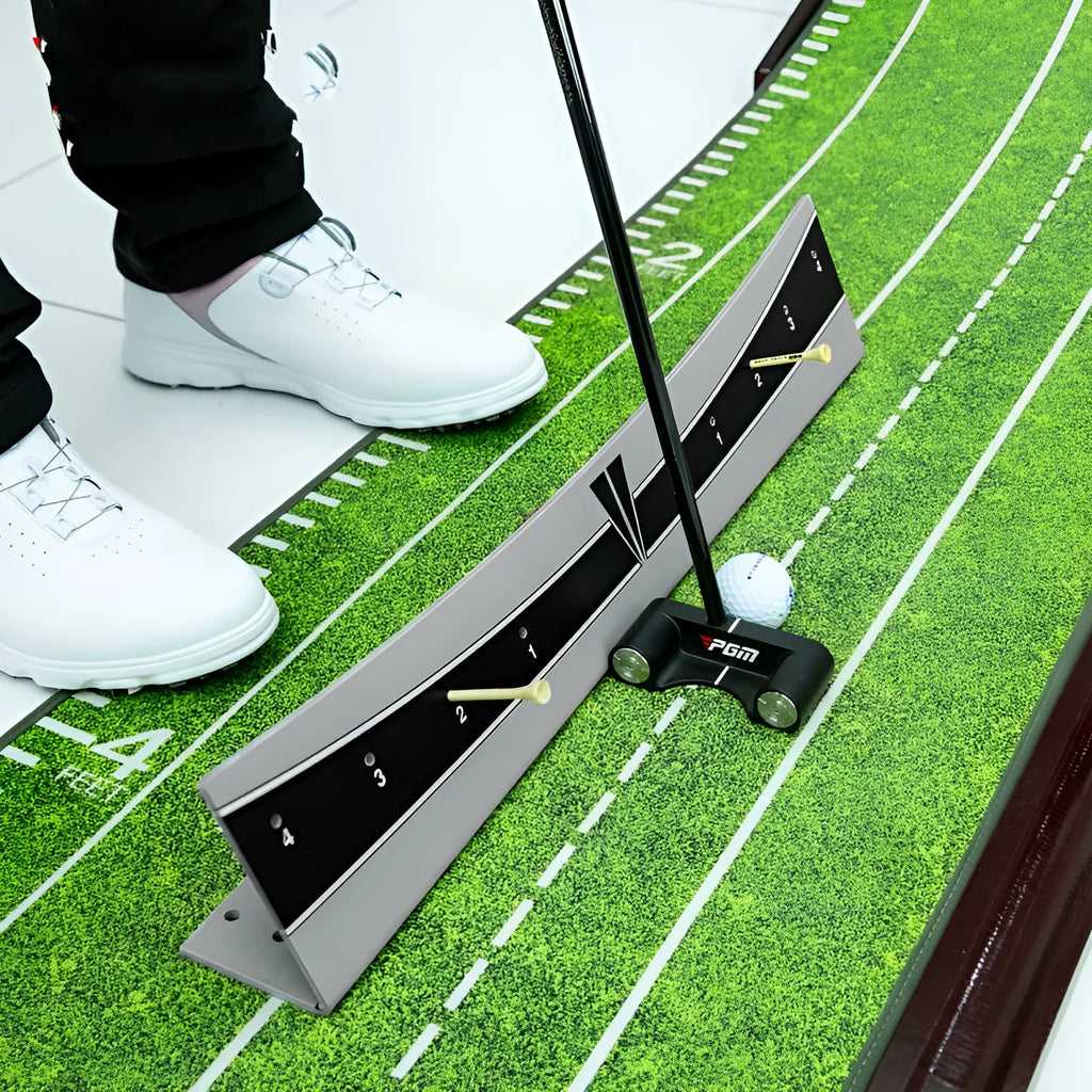 Adjustable golf putter trajectory balance simulator made from white PVC on a green mat.