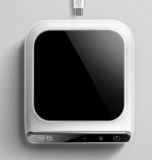 Black USB-powered cup warmer with tempered glass surface showing three temperature control settings