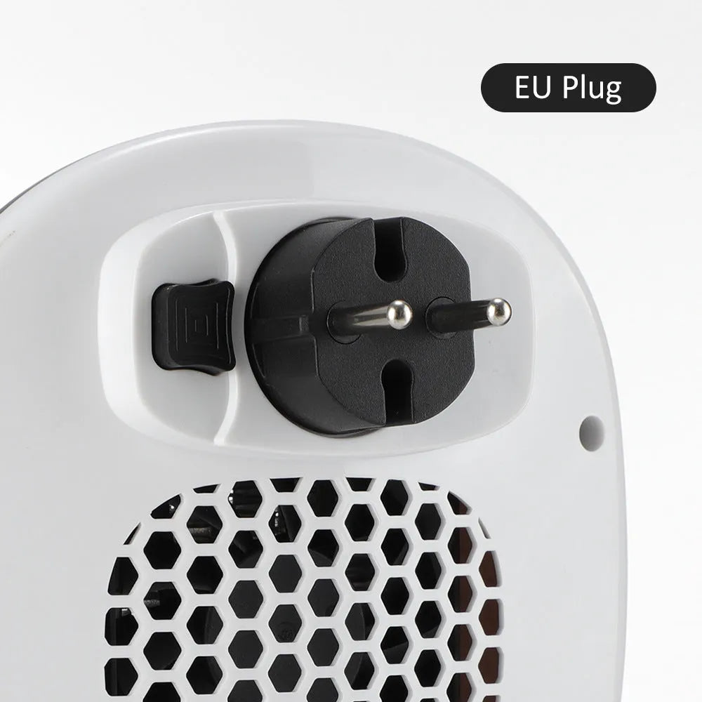 White ceramic heating electric hot air blower with remote control on a desk