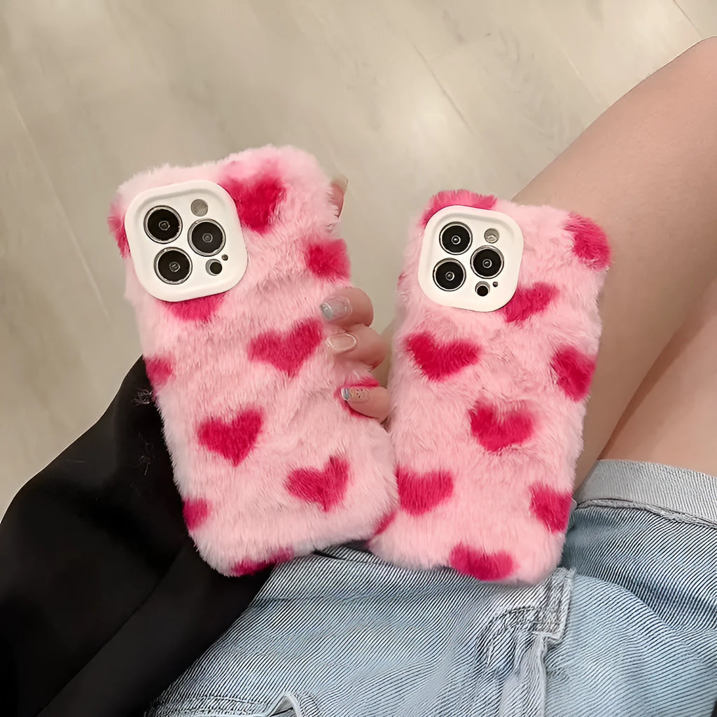 Pink silicone iPhone case featuring a Love Plush cartoon design on the back.