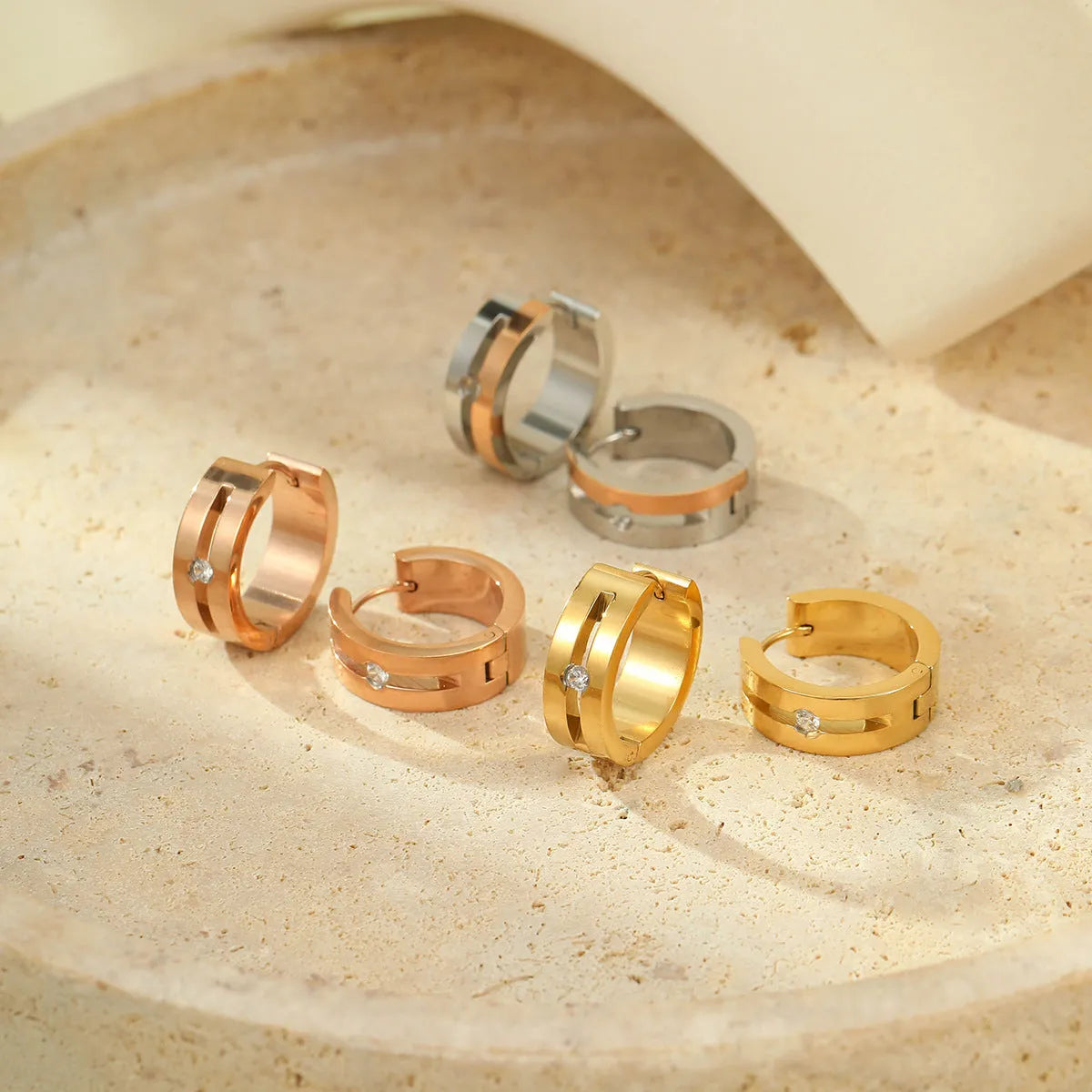 Women's geometric stainless steel drop earrings with 18K gold electroplating in golden finish