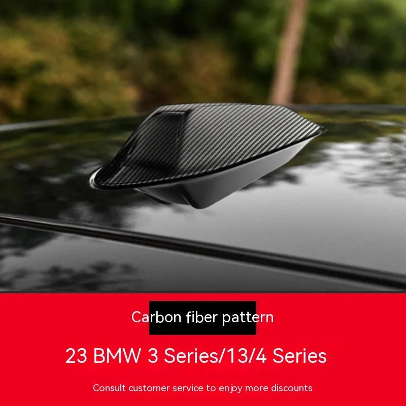 BMW shark fin antenna cover replacement in carbon fibre pattern and piano black finish options.