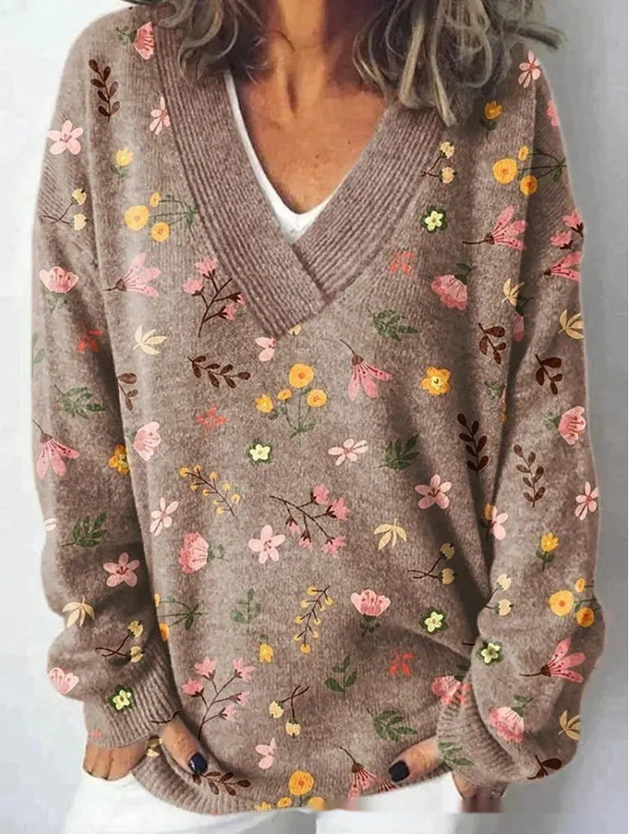 Women's V-neck long sleeve sweatshirt with a 3D floral print pattern.