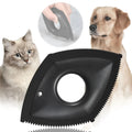 Silicone pet hair removal brush in black, green or red for cleaning sofas and car seats.