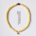 Yellow jade handmade double ring bracelet with lotus seedpod beads in 6mm and 8mm sizes