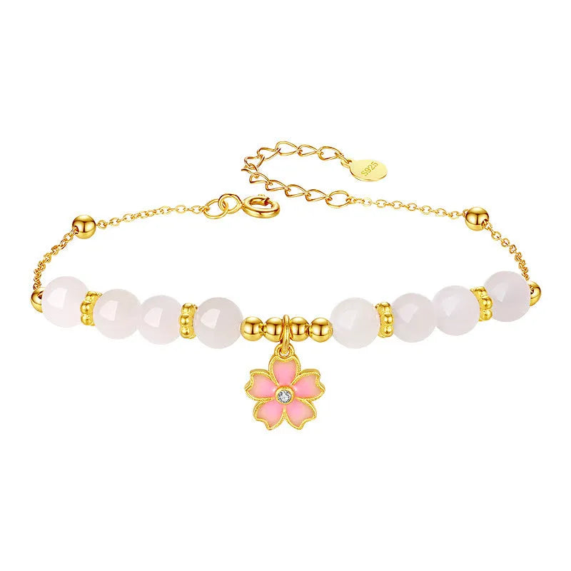 Pink gradient Hetian jade and 925 silver bracelet with epoxy cherry blossom pendant.