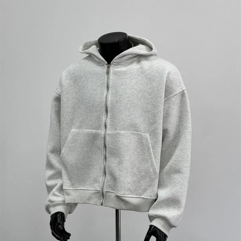 Light grey men's hoodie with a schoolbag design on the back, showing the hood and front zip.