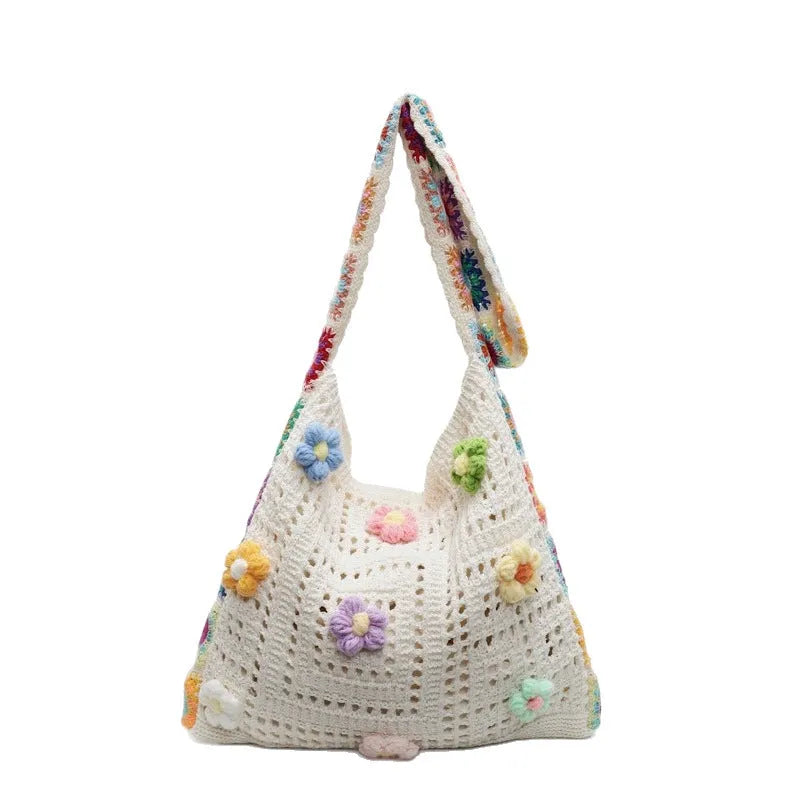 Woven polyester beach shoulder bag in milky white colour showing hollow knit pattern and single strap