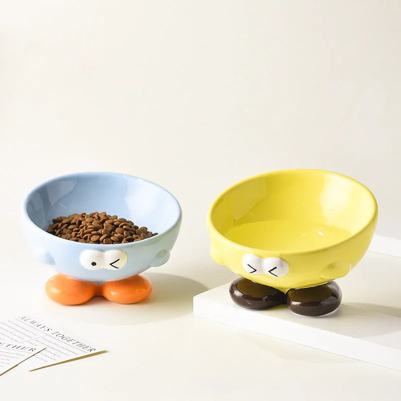Ceramic slanted pet bowl in blue colour showing oblique design for neck support during feeding