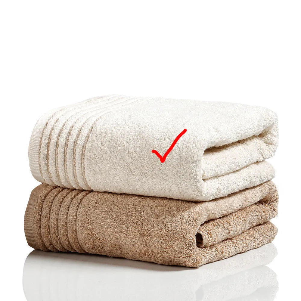 Cotton towel set showing bath, hand and face towels in beige or brown colours
