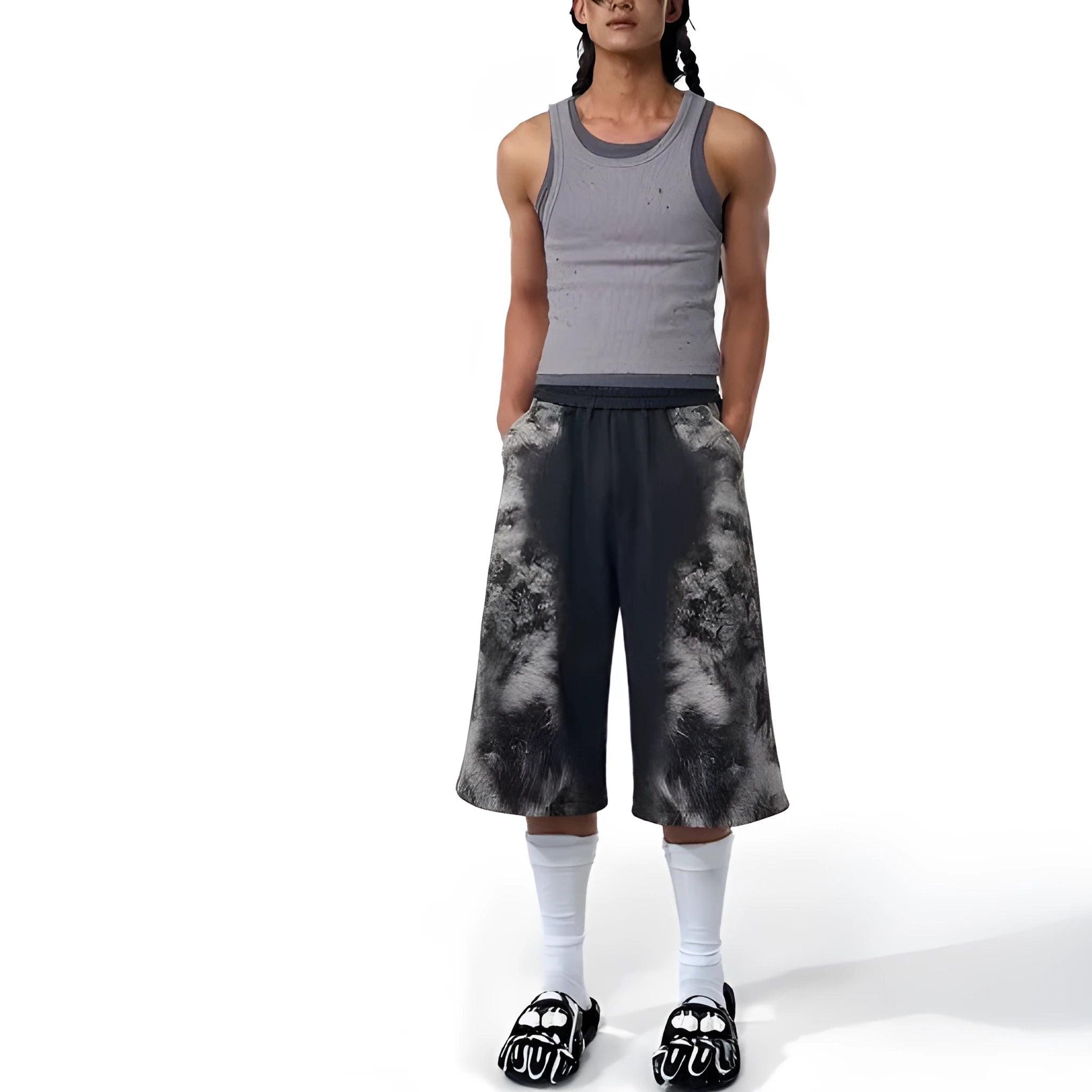 Women's printed loose trousers set in micro-elastic polyester with collage stitching, shown with matching hoodie and shorts.
