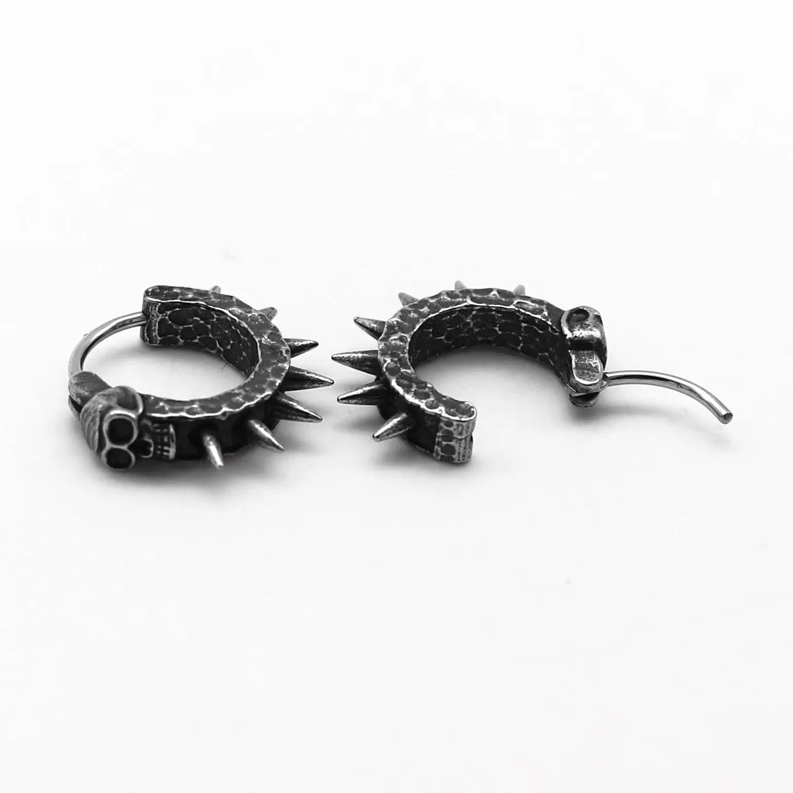 Black geometric alloy earrings with a punk motorcycle theme on a white background