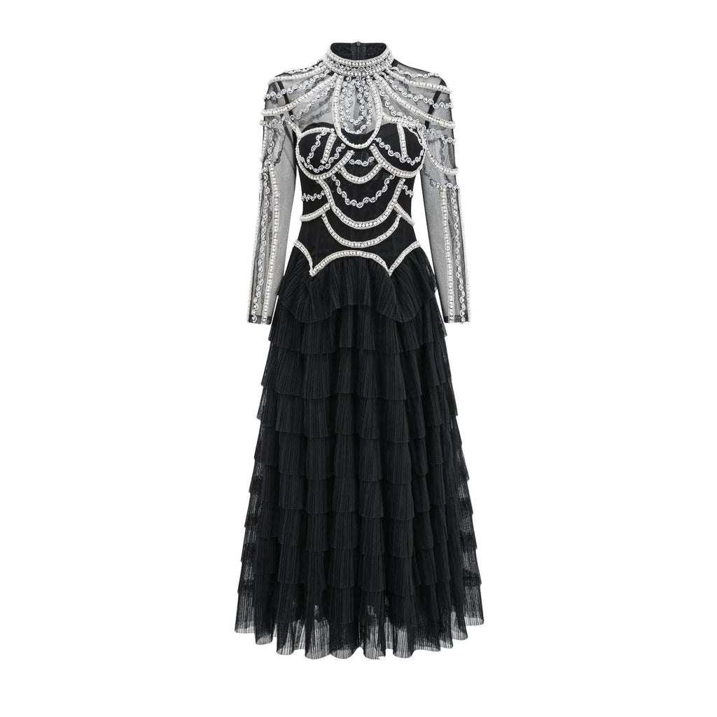 Women's black long sleeve beaded dress with a long skirt and mid waist, also available in pink.