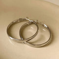 40mm circular metal hoop earrings in gold or silver finish