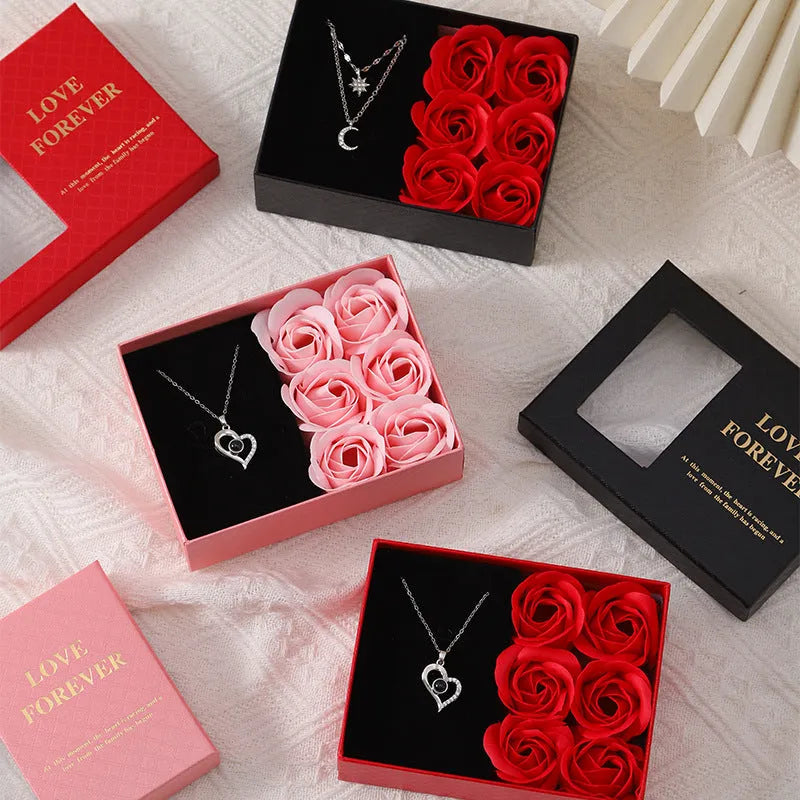 Korean style soap flower gift set with six red roses in a jewellery box, includes a handbag.