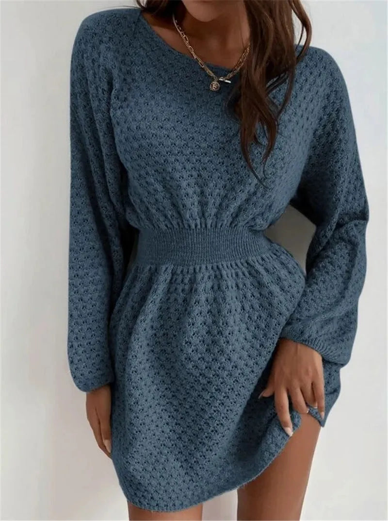 Blue women's knitted dress with fitted waist, crocheted flower details, and French round neckline