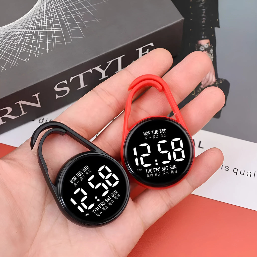 LED digital watch with luminous display showing time and weekday, available in multiple colours