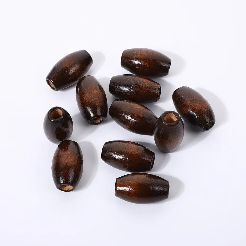 Dark coffee coloured oval wooden bead with M-shape profile, showing 6mm hole.