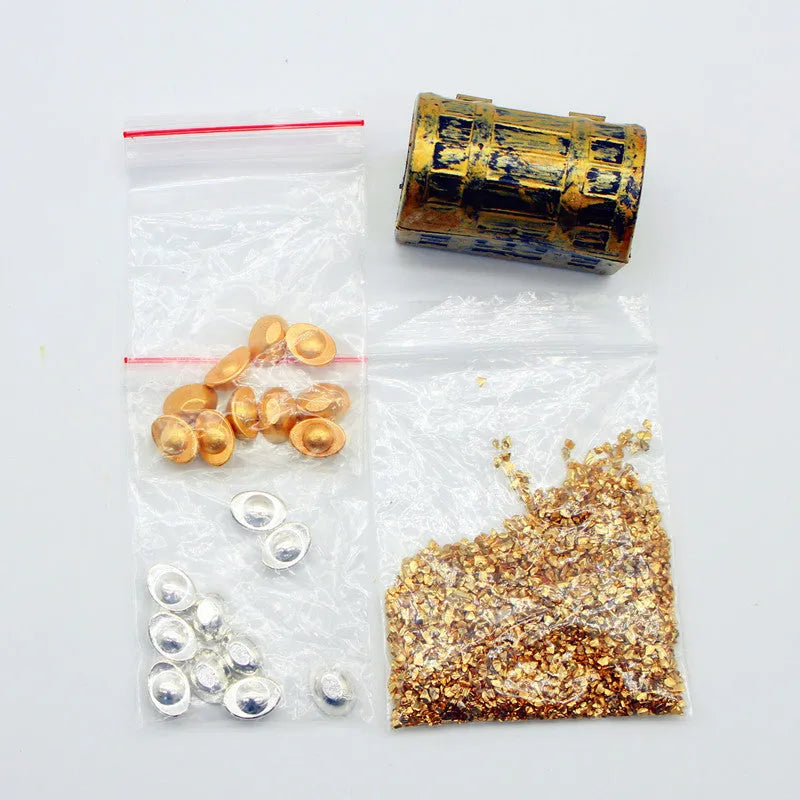 Miniature metal alloy gold coin and bar treasure box doll house accessory.