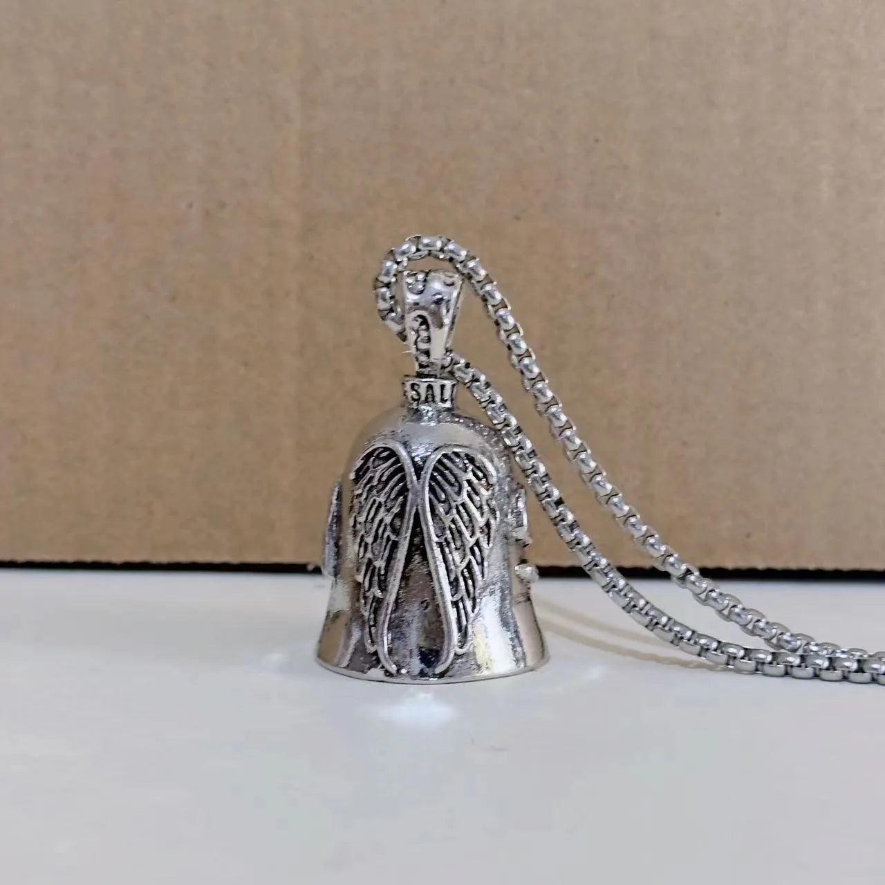 White angel feather keychain and necklace set with vintage finish and wings design