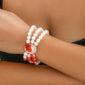 Halloween jewellery set with pearl collar necklace, matching bracelet and gold stud earrings