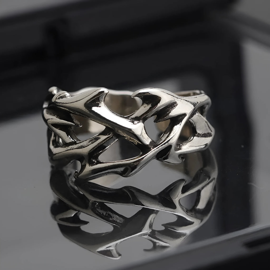 Adjustable copper men's ring with geometric thorn and flower design in J2150 colour.