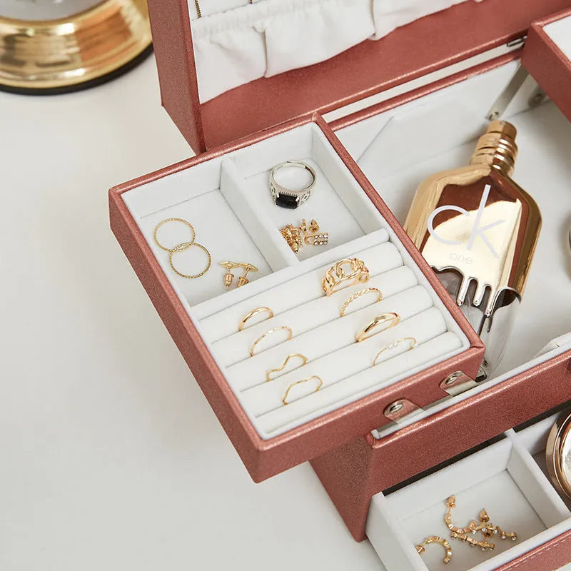 Hard-sided PU leather jewellery storage box in beige, showing its rectangular shape.