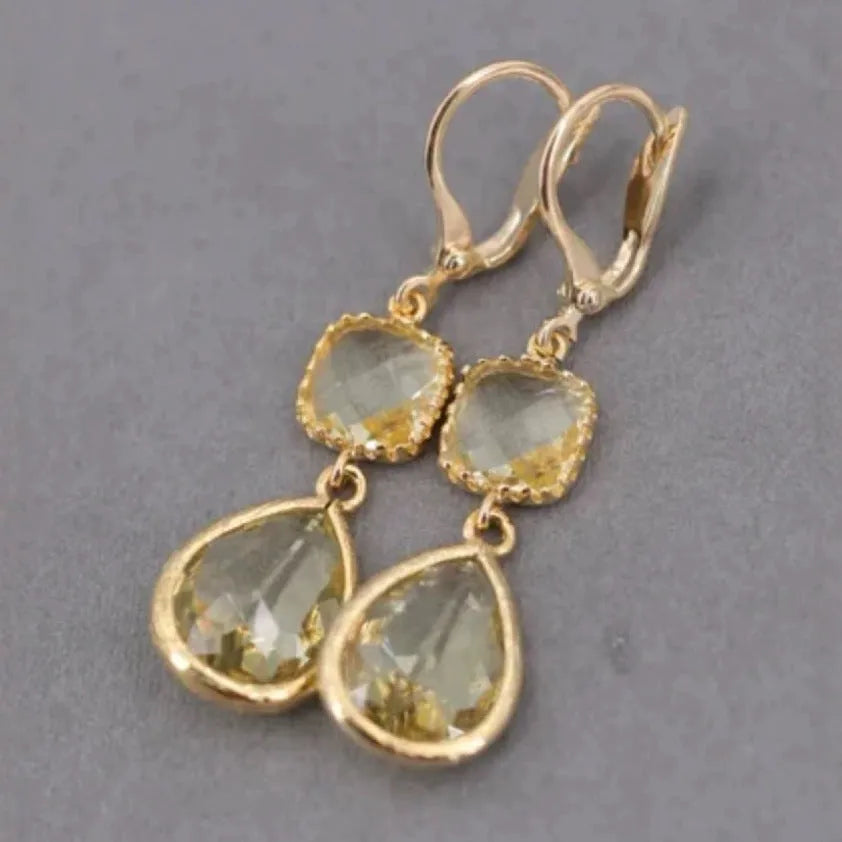 Gold geometric long fringe earrings with crystal water droplet design on copper base