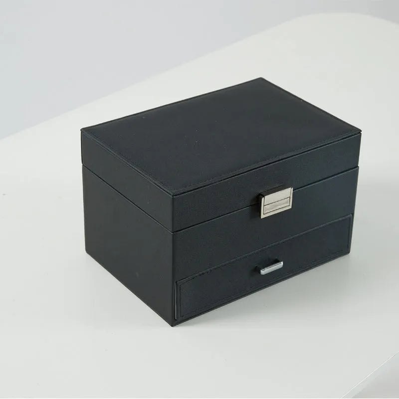 Hard-sided PU leather jewellery storage box in beige, showing its rectangular shape.